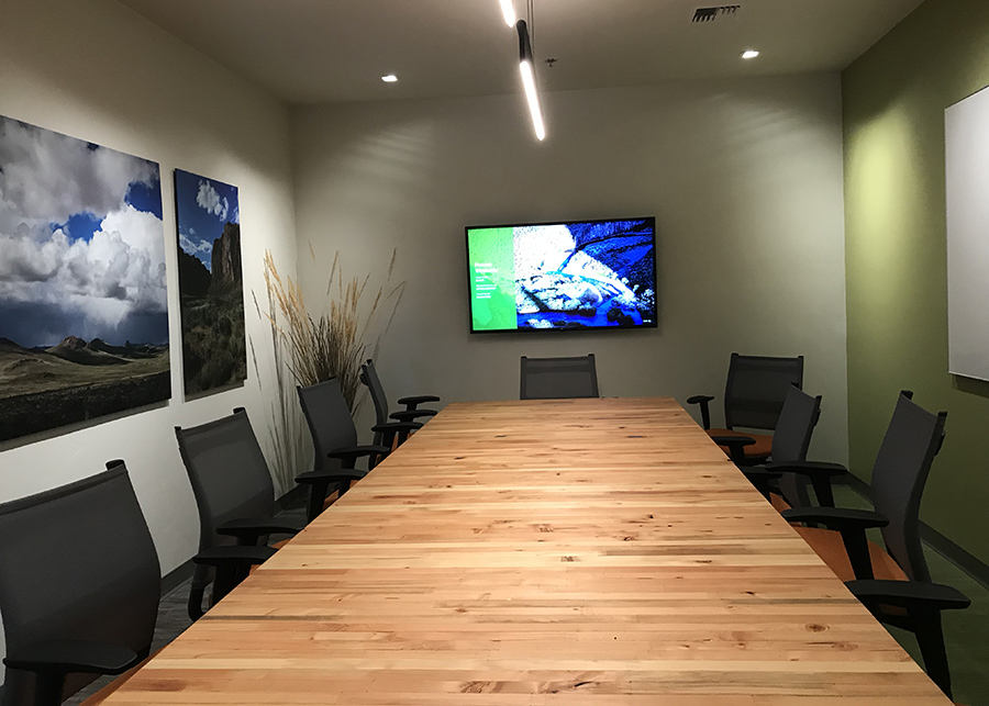 The long conference table custom-made for the space